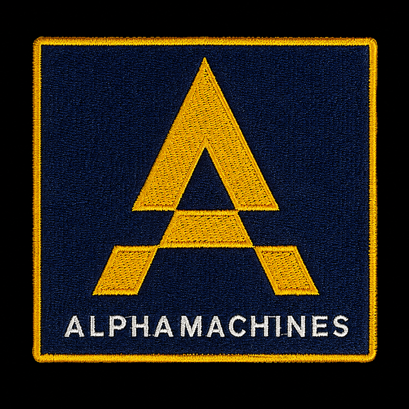 Alpha Machines patch — custom embroidery by Emporium Embroidery