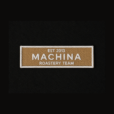 Machina patch — custom embroidery by Emporium Embroidery
